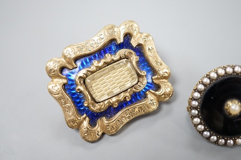 A Victorian yellow metal overlaid and blue enamel set mourning brooch, 31mm and one other seed pearl set mourning brooch.